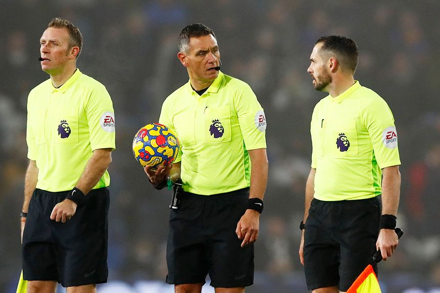 Premier League referee Andre Marriner and his assistants